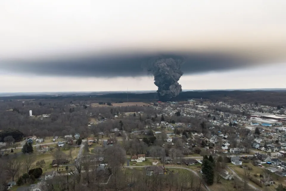 Gray chemical cloud seen from a distance from train derailment in Palestine, Ohio